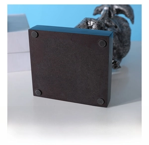 Detail view of the resin statue square black base with non-slip pads for stability