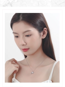 Chic silver crystal aurora water drop necklace with pony pendant on female model neck
