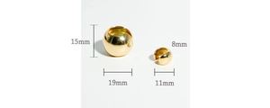 Detailed size comparison of small and large gold spherical ear clips in mirror finish