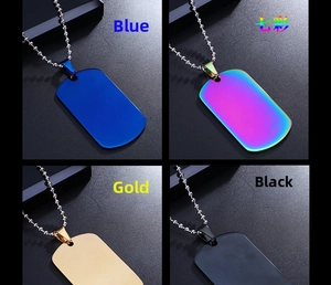 Detail view of steel dog tag necklaces in blue, rainbow, gold, and black colors
