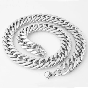 Close-up of polished silver Cuban link chain with a secure lobster clasp closure