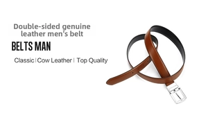 Close-up of double-sided genuine leather belt with rotating silver buckle and stitching