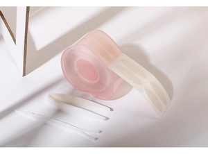 Lace eyelid tape kit featuring nude mesh stickers with tweezers and a white Y-fork tool