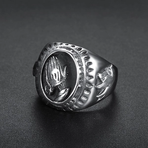 Polished stainless steel prayer hands ring for men featuring a detailed relief design