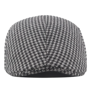 Classic black and gray houndstooth flat cap with warm padded lining for autumn and winter