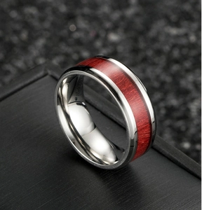 Polished titanium steel ring with redwood inlay inlay for men on dark display stand