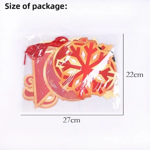 Christmas paper banner set with red and gold snowflakes in clear plastic packaging