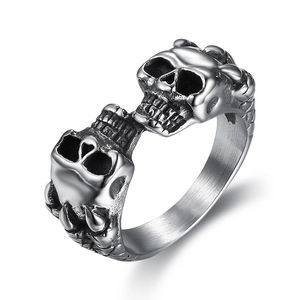 Antique silver double skull stainless steel ring for men and women on white background