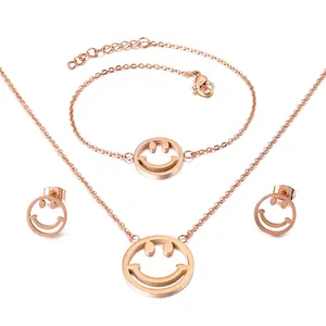 Rose gold titanium jewelry set with hollow smiley face necklace bracelet and earrings