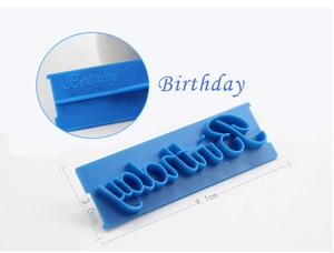 Detail of blue Birthday plastic stamp mold with 9.1cm x 3.0cm size markings for baking