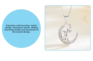 Macro detail of silver moon and cat pendant with sparkling cubic zirconia on a necklace