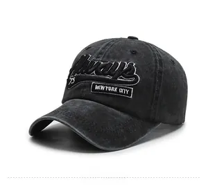 Detail of vintage washed cotton baseball cap featuring 3D New York City embroidery