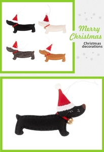 Detail of dachshund felt ornaments set with mini Santa hats and small golden bells