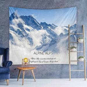 Detail of Alpine Alps snowy mountain tapestry hanging on a modern bedroom wall