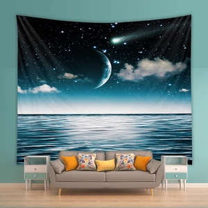 Detail of bedroom tapestry showing dreamlike crescent moon and ocean scenery background