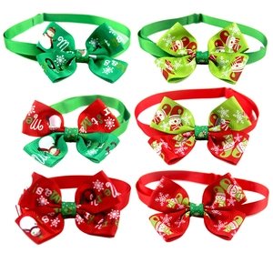 Set of six festive Christmas pet bowties with snowman and snowflake patterns