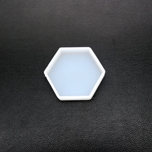 Macro view of a hexagonal silicone coaster mold for clear resin DIY crafts