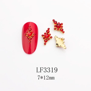 Détails de bijoux à ongles en strass rouge avec base dorée et dimensions 7x12mm incluses