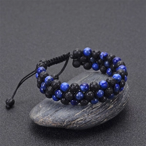 Detail of hand-woven three-layer lava stone and lapis lazuli beads with adjustable cord