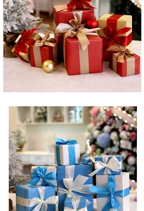 Detail of Christmas gift boxes with satin ribbons in festive red, gold and blue colors