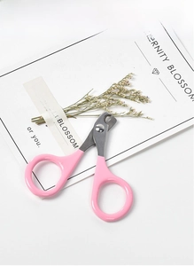 Pink ergonomic cat nail clipper with curved stainless steel blades for kittens