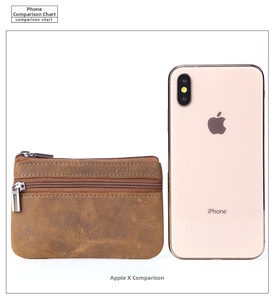 Size comparison of a vintage brown crazy horse leather coin purse against an iPhone X