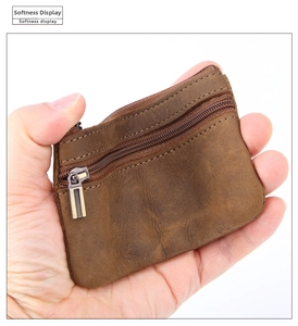Close-up showing the high softness and texture of vintage crazy horse leather coin pouch