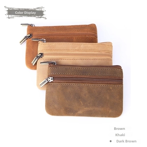 Three vintage crazy horse leather coin purses in brown, khaki, and dark brown colors