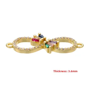 Macro view of gold infinity connector with colored zircons and 3.6mm thickness detail