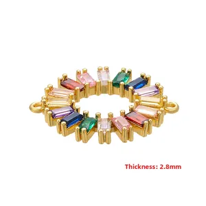 Detail of round gold connector link with rainbow baguette zircon stones, 2.8mm thickness