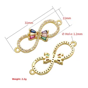 Macro view of gold infinity connector with rainbow cubic zirconia and size dimensions