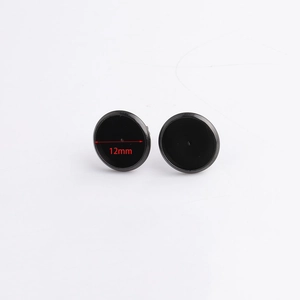 Detailed view of matte black stainless steel 12mm round earring base studs