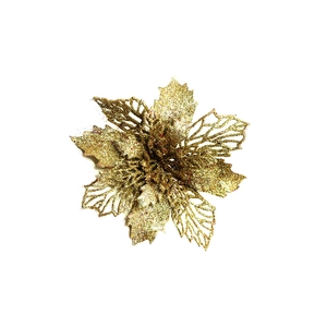 Macro detail of artificial golden glitter Christmas flower for tree and DIY holiday decor