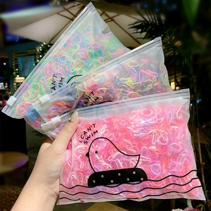 Three packs of colorful elastic hair bands in matte bags with cute bird patterns