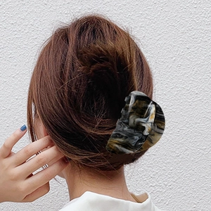 Classic black and white marble pattern large hair claw clip for elegant hair styling