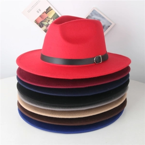 Close-up of classic wool fedora hats stacked in eight different autumn colors