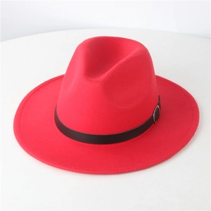 Detail of red wool fedora hat featuring a black leather band with silver metal buckle