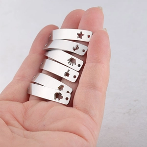 Polished stainless steel connectors with hollow elephant and crown cutout patterns