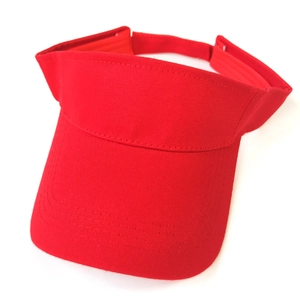 Detail of red cotton sun visor showing high-quality stitching and breathable fabric