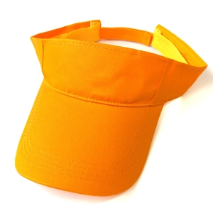 Detail of bright orange cotton sun visor with velcro strap and durable twill texture