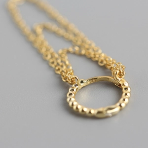 Elegant S925 sterling silver gold hoop earring with beaded texture and tassel chain detail
