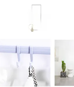 Detail view of white plastic hooks on a horizontal rail with snap-on design and fabric