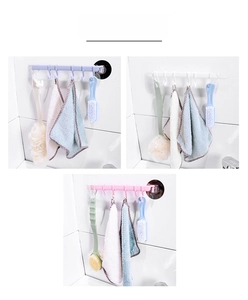 Detail view of 6-hook wall rack in blue white and pink for bathroom organization