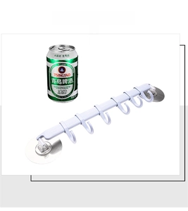 Wall-mounted six-hook rack in white plastic for kitchen storage shown with a beer can for scale