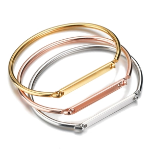 Three-piece stackable metal open C-shape bangles in gold, silver, and rose gold finish