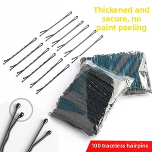 Detail showing 100 pieces of thick black metal bobby pins in plastic packaging