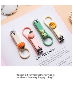 Set of 4 cute cartoon nail clippers with peach, pumpkin, dinosaur, and banana relief patterns