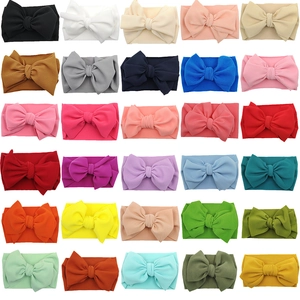30-piece collection of infant waffle fabric headbands with large bows in varied colors