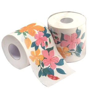 Two rolls of printed toilet paper featuring colorful floral patterns on a white background
