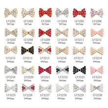 Detailed catalog showing 30 styles of bow nail charms with rhinestones and pearls